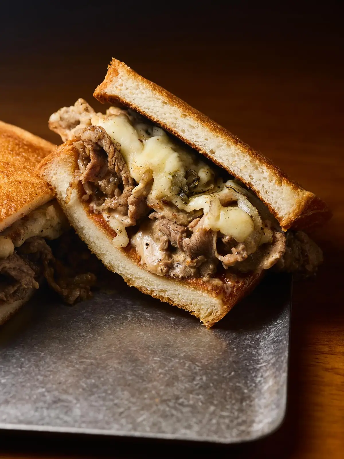 A richly filled toast sandwich at To;asta.