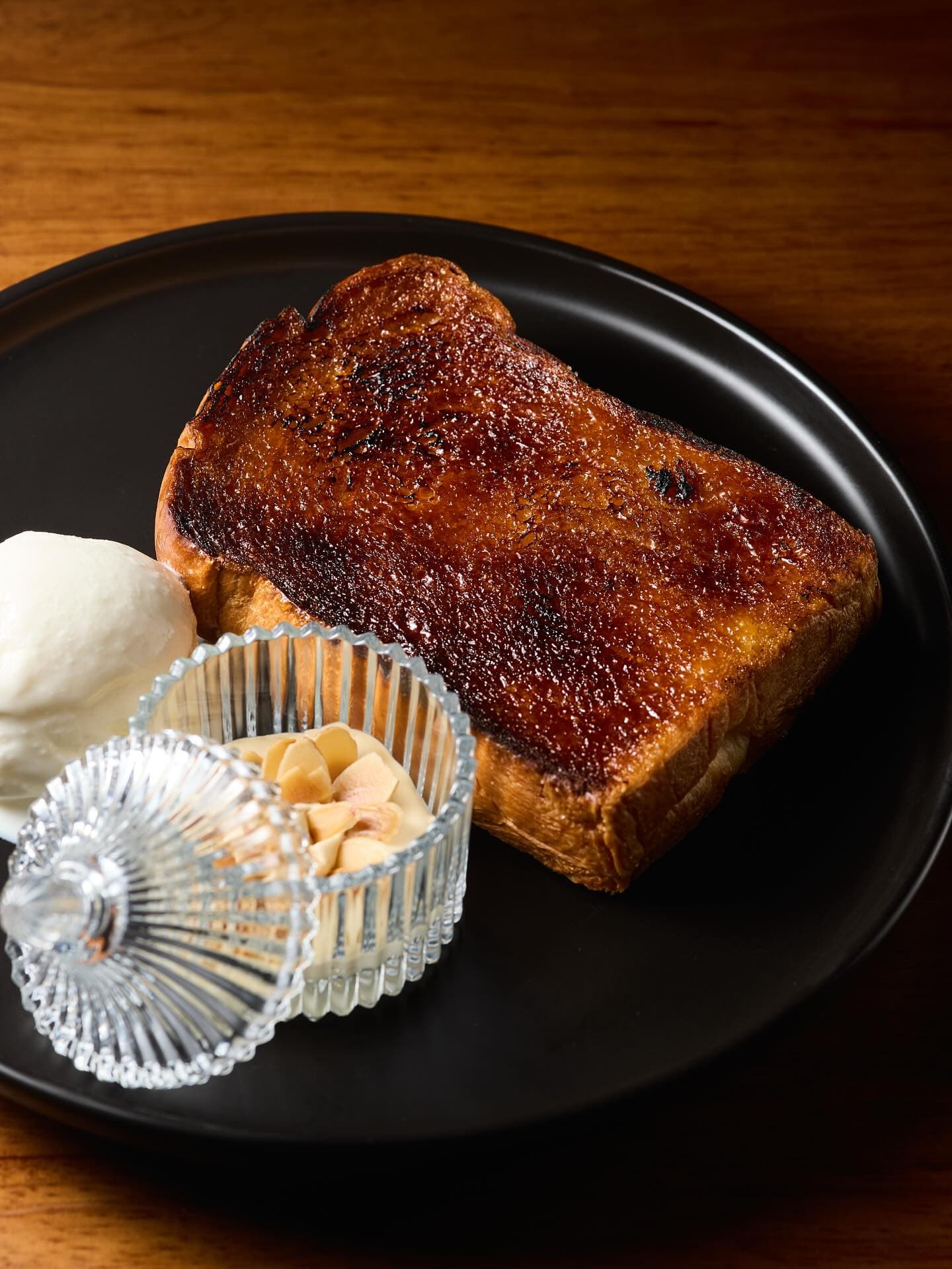 A plated toast dish from To;asta.